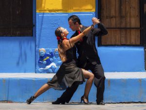 Buenos Aires, Argentina - December 15, 2009: Street performers demonstrate the tango in the historical district of La Bocca in Buenos Aires, Argentina.